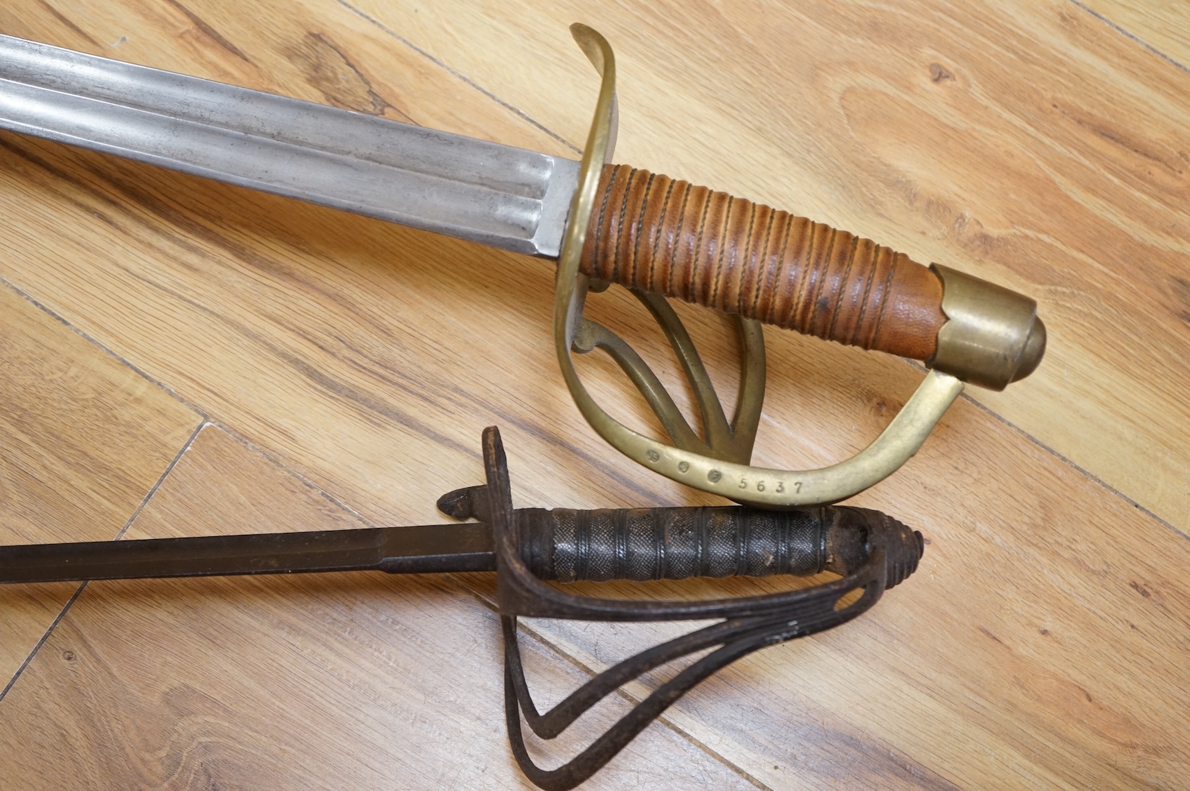 A Victorian Royal Artillery officer’s sword in poor condition and a copy of a French 1813 Cuirassier’s sword (2)